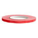 A roll of Lavex red poly bag sealer tape.