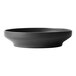 A black Oneida Moira stoneware deep plate on a black surface.