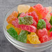 A bowl filled with colorful Albanese Sour Gummi Bears.