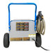 A blue and white Delco electric pressure washer on wheels.