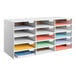 A white ADIRoffice literature organizer with colorful folders on the shelves.