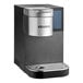 A black and silver Keurig K-2500 commercial single serve pod coffee maker with a screen and a lid.