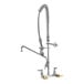 A silver T&S EasyInstall wall-mounted pre-rinse faucet with a chrome 44" hose.