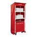 A red Royal Basket Trucks laundry cart with towels on it.