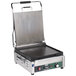 A Waring Tostato Supremo Panini Grill with a griddle and lid.