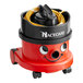 A red and black NaceCare canister vacuum cleaner with a red handle.