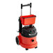 A red and black NaceCare Solutions ProVac canister vacuum with a basket.