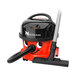 A red and black NaceCare Solutions Latitude canister vacuum with a red handle.