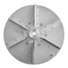 A circular metal blower wheel with four holes.