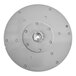 A circular metal blower wheel with holes in it.