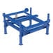A blue steel Vestil intermediate bulk container tilt stand with adjustable legs.