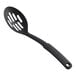 A black slotted nylon spoon with a handle.