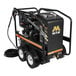 A black Mi-T-M hot water pressure washer with wheels and a hose attachment.
