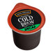 A black Java House container with an orange lid filled with decaf cold brew coffee pods.