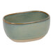 A Front of the House Artefact moss porcelain sugar caddy with a green and brown glaze.
