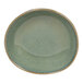 A moss green Front of the House round porcelain ramekin with a white background.