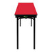 A red rectangular National Public Seating table with a black T-mold edge.