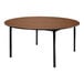 A National Public Seating round Montana walnut plywood folding table with black legs.