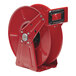 A red metal Reelcraft hose reel with black handles.