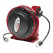 A red and black Reelcraft electrical cord reel.