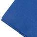 A stack of navy blue Hoffmaster paper dinner napkins.