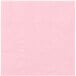 A close-up of a pink paper napkin with a small square pattern and a white border.