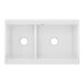 A white rectangular Elkay double bowl farmhouse sink with two holes.