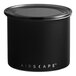 A matte black Planetary Design Airscape round airtight food storage container.