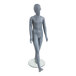 An Econoco Slate 6-year-old unisex mannequin standing on a glass surface.