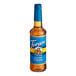 A Torani Sugar-Free Classic Caramel flavoring syrup 750 mL plastic bottle.