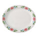 A Tuxton China oval platter with pink flowers on it.