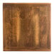 A wood square object with a wood surface with a vintage finish.
