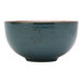 A Tuxton TuxTrendz Azure China bowl with speckled brown and blue on a white background.