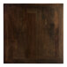 A Lancaster Table & Seating square wood table top with espresso finish.