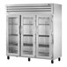 A True reach-in refrigerator with glass doors.