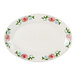 A white Tuxton china oval platter with pink flowers on it.