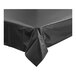 A black plastic Table Mate table cover roll on a table.