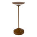 An Abert Tempo copper table lamp with a white circle on top sitting on a table.
