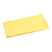 A yellow rectangular Table Mate plastic cover folded on a white background.