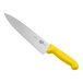A Victorinox chef knife with a yellow handle.