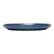A Libbey blue terracotta stack plate with a black rim.
