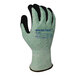 A close-up of a green Armor Guys Basetek heavy duty work glove with black palm coating.
