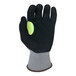 A gray and black Armor Guys heavy duty work glove with a green palm and yellow thumb crotch.