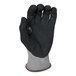 A black Armor Guys work glove with gray and white trim.