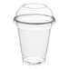 A clear plastic Choice cold cup with a dome lid on top.