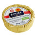A round gold Echire butter packet with a white label.