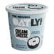 A container of Oatly plant-based cream cheese with white packaging.