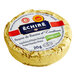 A round gold foiled portion packet of Echire butter with a white label.