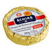 A round gold Echire butter foil packet with a red and white label.