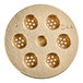 A circular gold Estella spaghetti pasta die with holes in it.